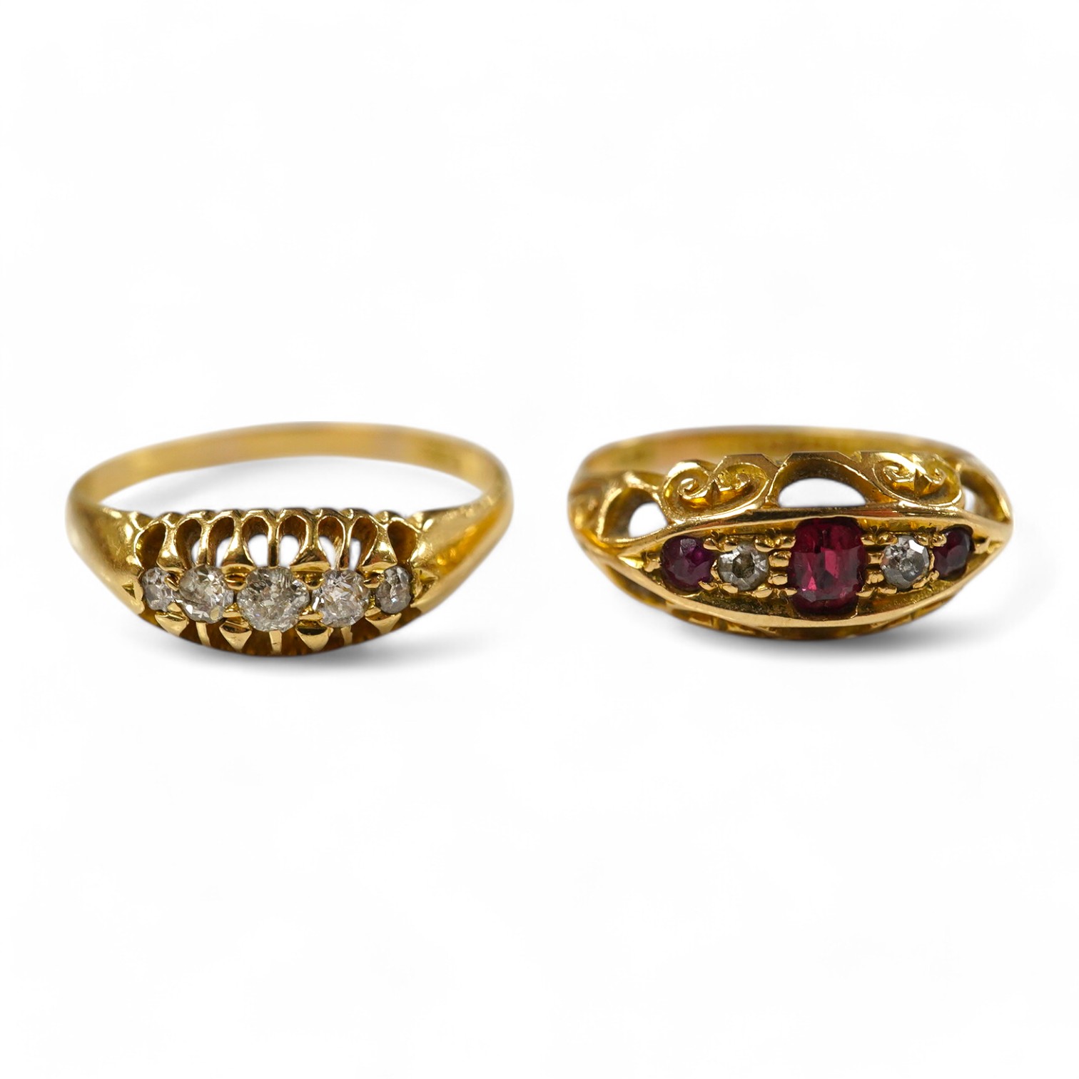 An early 29th century 18ct gold, ruby and diamond set ring, size M and a similar 18ct and graduated five stone diamond chip set ring, gross weight 5.1 grams. Condition - poor